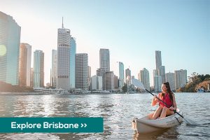 Kayaking on Brisbane river with city views